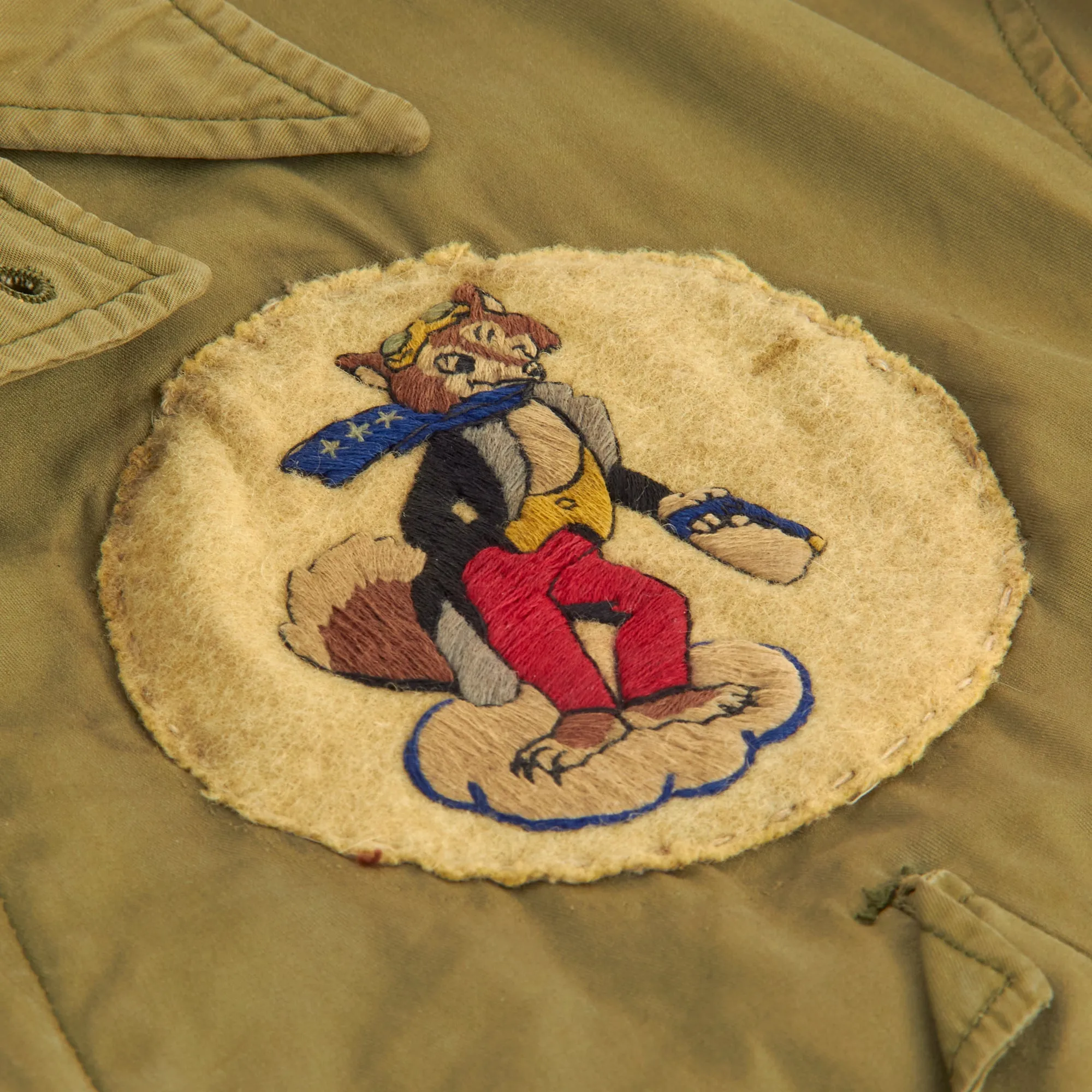 Original U.S. WWII M1941 Field Jacket With Disney 31st Fighter Squadron Patch and Painted Artwork on Reverse